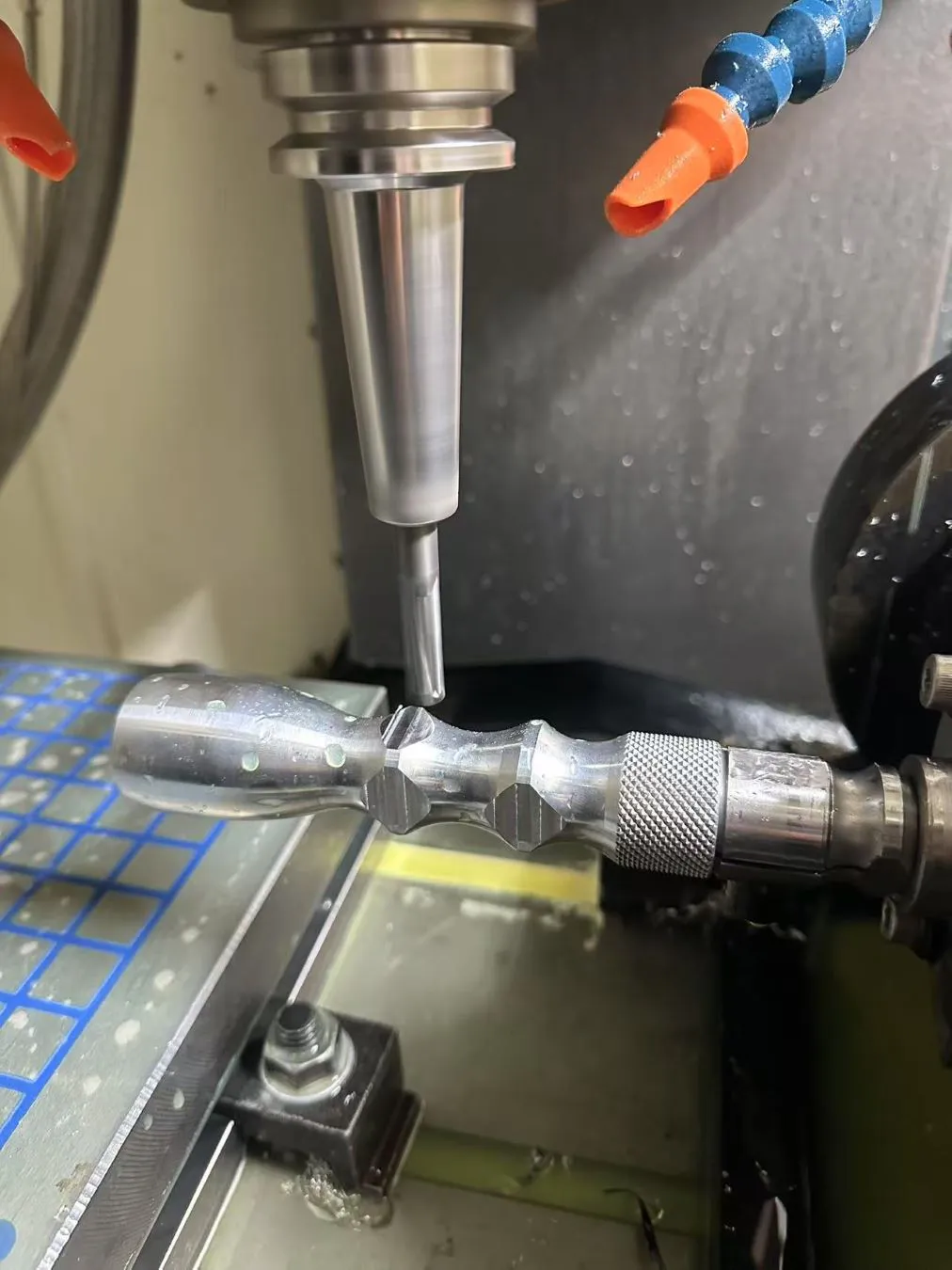 Precision aluminum CNC machining process milling a custom 6061 or 7075 aluminum alloy component.